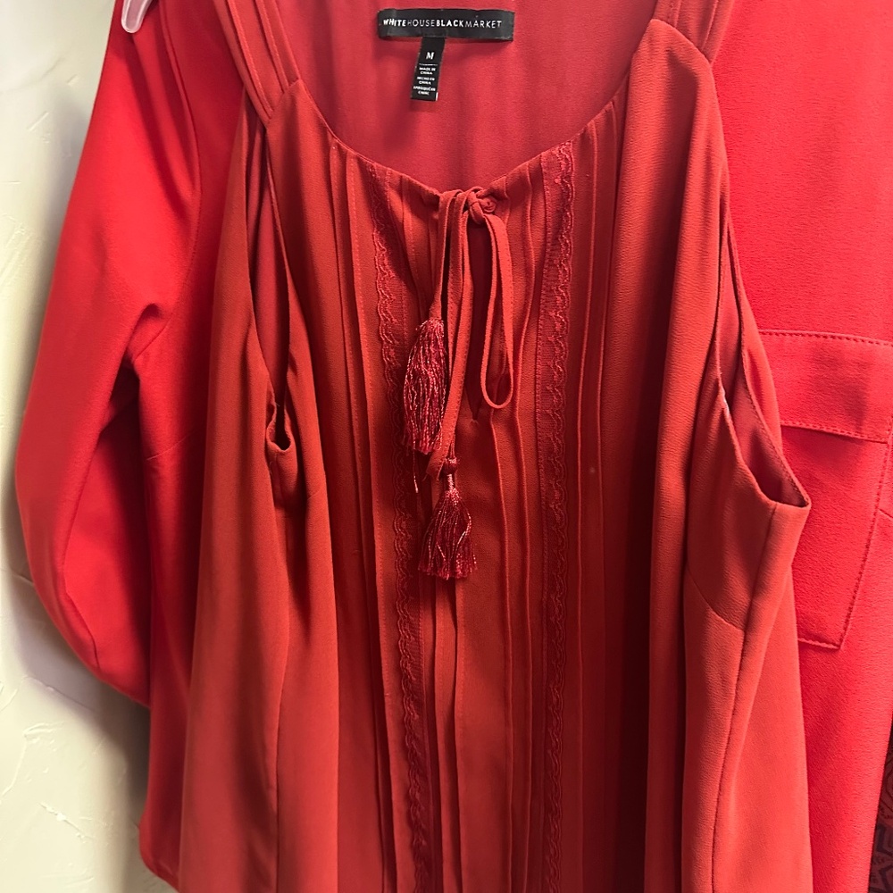 Sleeveless red top